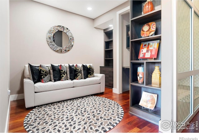 living room featuring dark hardwood / wood-style floors