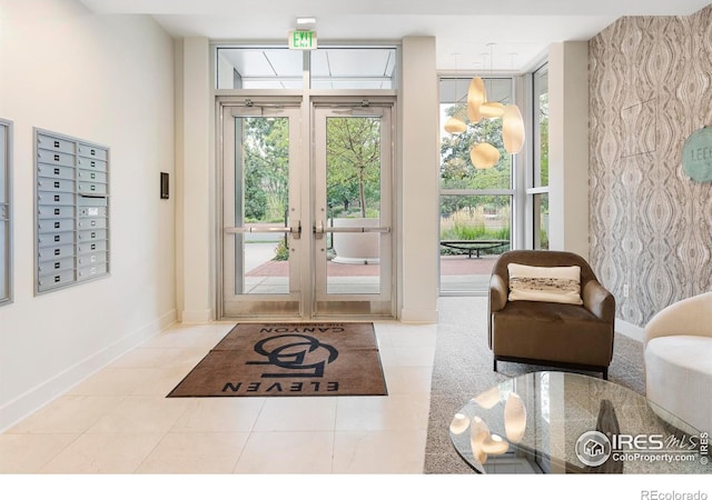 interior space with mail boxes and light tile patterned floors