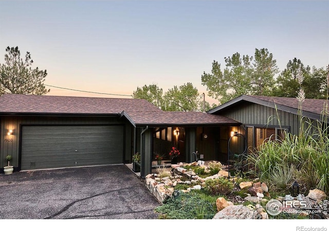 view of front of home with a garage