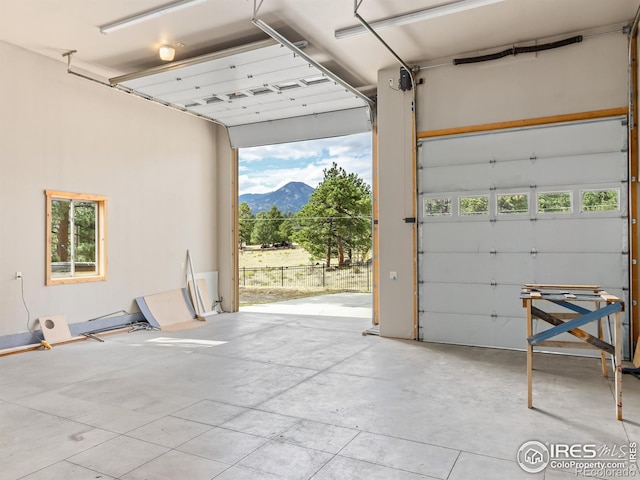 garage featuring a mountain view