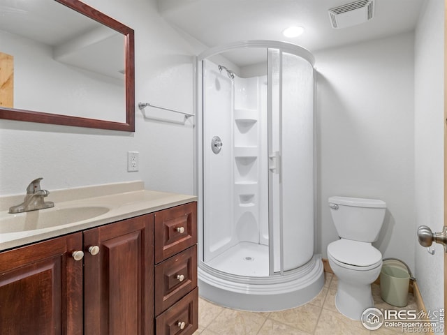 bathroom with walk in shower, vanity, and toilet