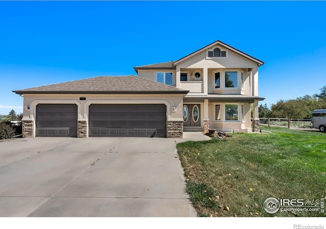 traditional home featuring a front lawn, stone siding, concrete driveway, fence, and a garage