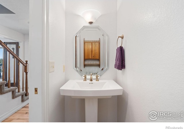 bathroom with wood finished floors
