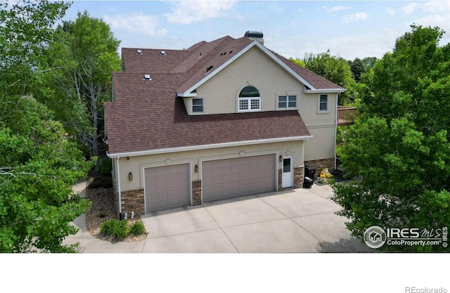 view of front of property featuring a garage