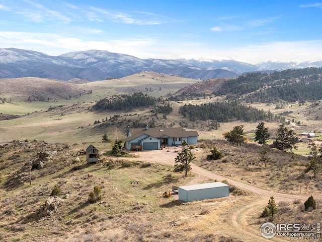 view of mountain feature with a rural view