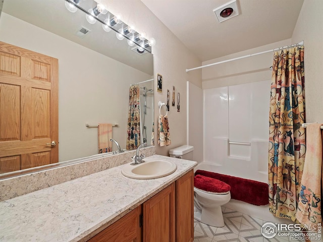 full bathroom featuring tile patterned flooring, vanity, toilet, and shower / tub combo with curtain