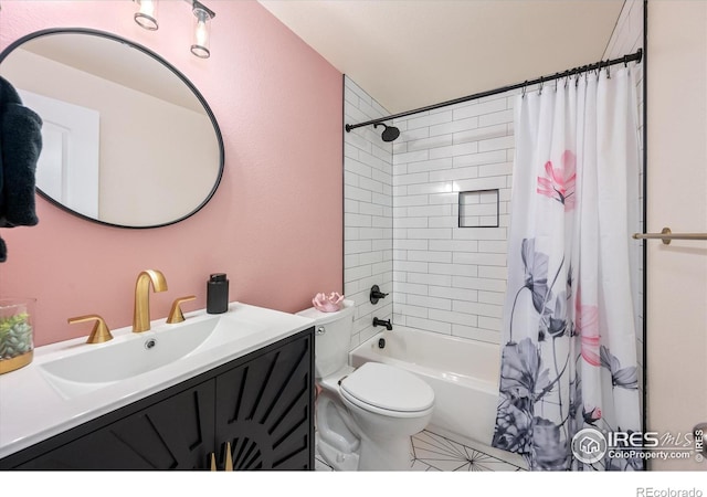 full bathroom featuring vanity, shower / bath combo with shower curtain, and toilet