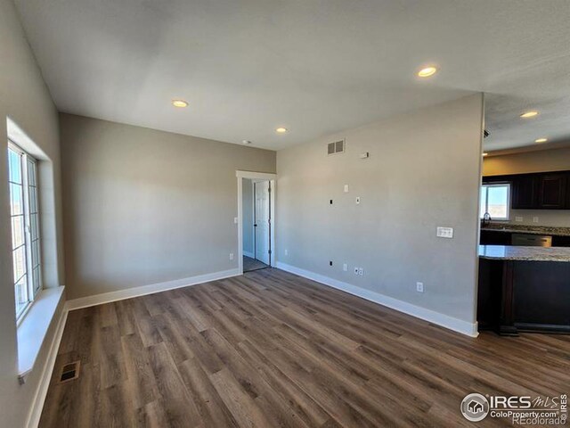 interior space with dark hardwood / wood-style floors