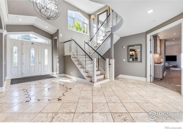 8001 Fairview Rd, Boulder, CO 80303 - foyer entrance featuring baseboards, stairs, recessed lighting, high vaulted ceiling, and a chandelier