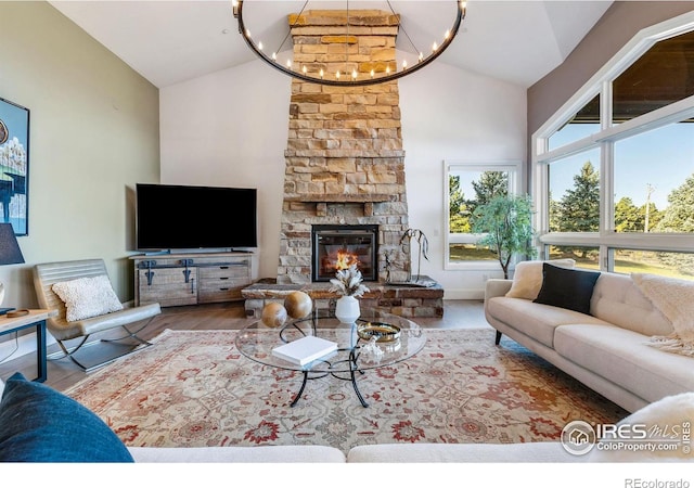8001 Fairview Rd, Boulder, CO 80303 - living room with high vaulted ceiling, a chandelier, a fireplace, and wood finished floors