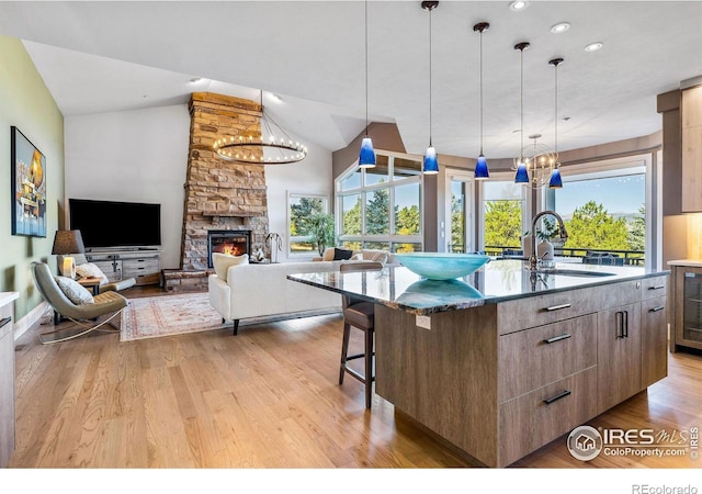8001 Fairview Rd, Boulder, CO 80303 - kitchen with a sink, a chandelier, modern cabinets, lofted ceiling, and recessed lighting