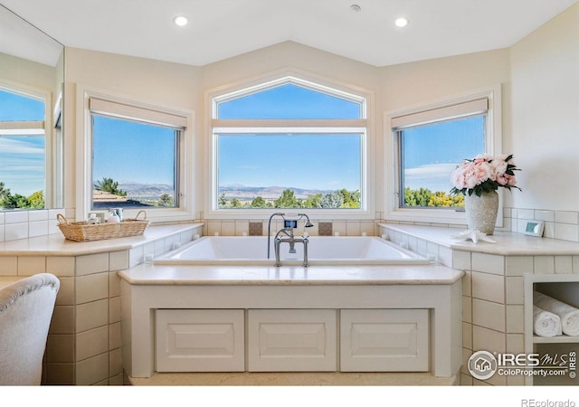 8001 Fairview Rd, Boulder, CO 80303 - bathroom with plenty of natural light, a bath, and recessed lighting