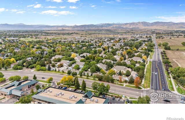 drone / aerial view featuring a mountain view