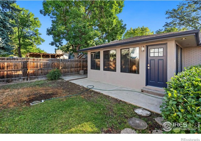 exterior space with a patio