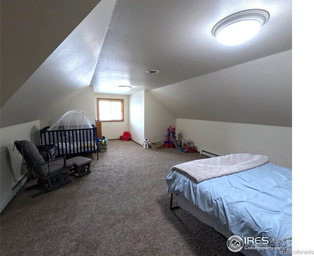 carpeted bedroom with a textured ceiling, a baseboard radiator, and lofted ceiling