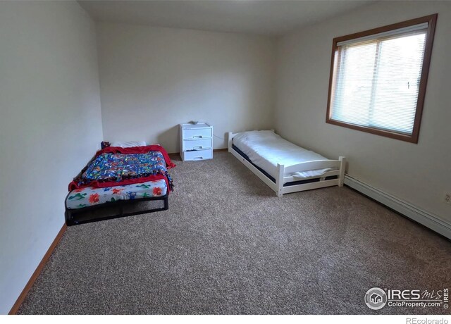 unfurnished bedroom featuring carpet floors and baseboards