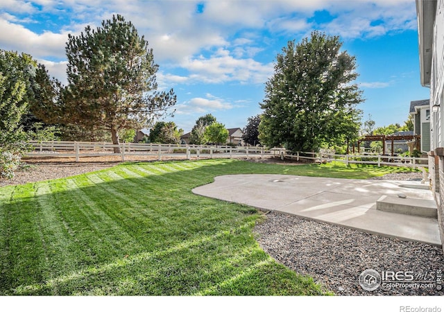 view of yard featuring a patio and a pergola