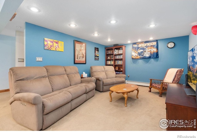 living room featuring light carpet and baseboard heating