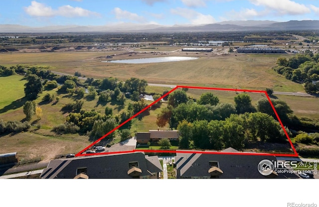 bird's eye view featuring a water and mountain view