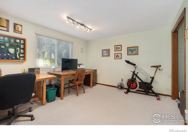 office area with carpet flooring and baseboards