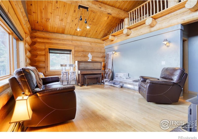 living room featuring beamed ceiling, light wood-type flooring, log walls, and wooden ceiling