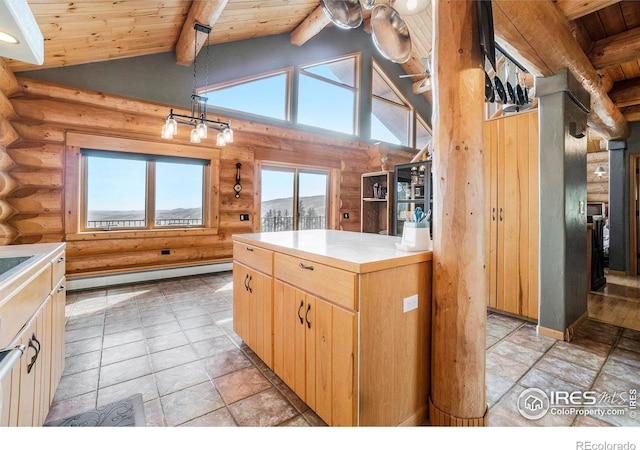 kitchen with beam ceiling, rustic walls, a baseboard heating unit, and wood ceiling