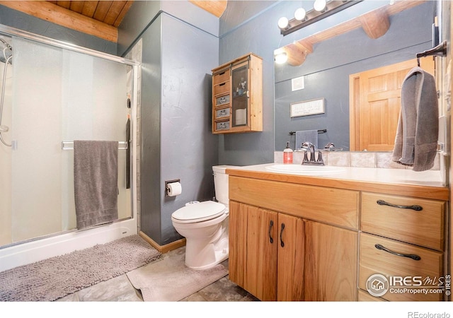 bathroom with tile patterned floors, wood ceiling, vanity, a shower with door, and toilet