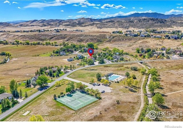 aerial view with a mountain view and a rural view