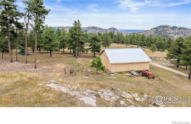 property view of mountains with a rural view