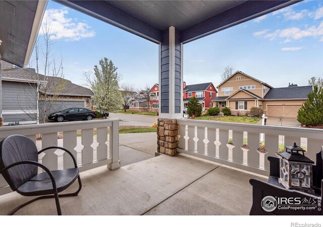 view of patio / terrace featuring a garage