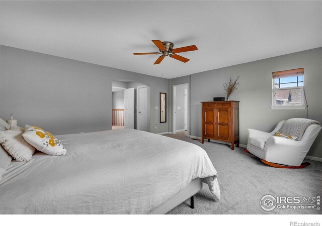 bedroom with carpet and ceiling fan