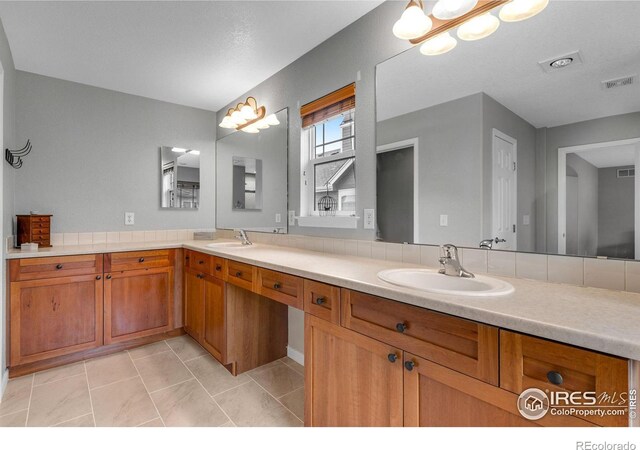 bathroom featuring vanity and tile patterned floors