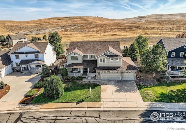 bird's eye view with a mountain view