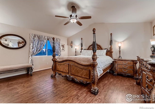 bedroom with ceiling fan, dark hardwood / wood-style flooring, and lofted ceiling