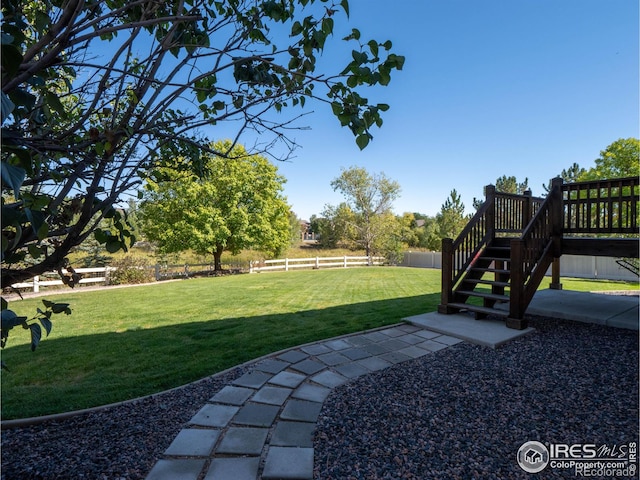 view of yard with a deck