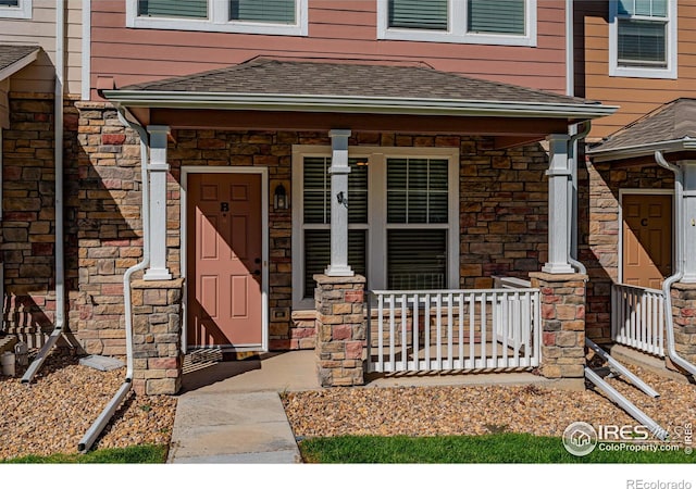 entrance to property with covered porch