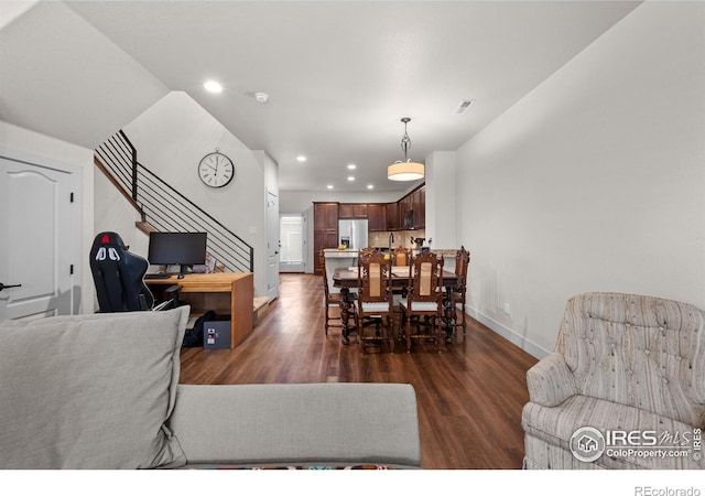 living room with dark wood-type flooring