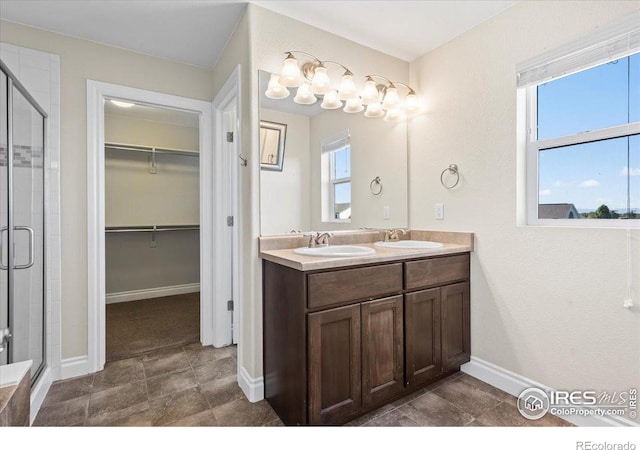 bathroom featuring vanity and walk in shower