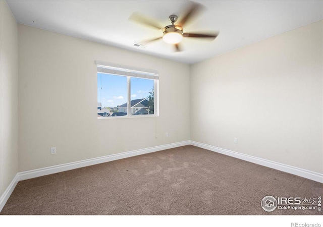 carpeted empty room with ceiling fan