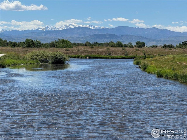 property view of water featuring a mountain view