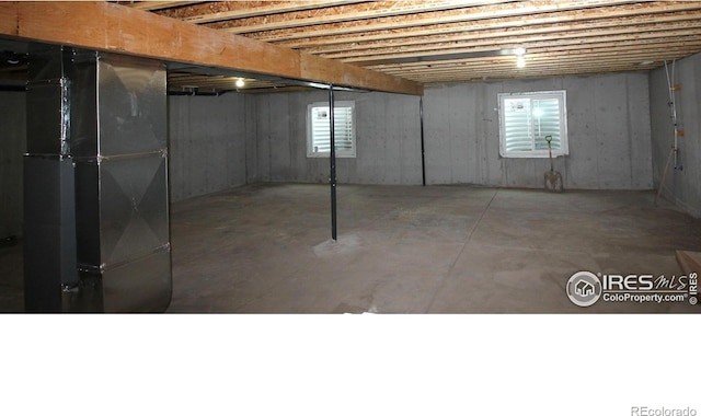 basement featuring plenty of natural light