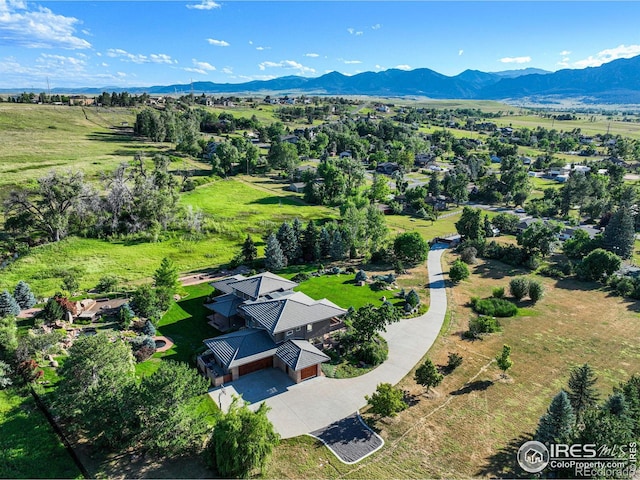 bird's eye view with a mountain view