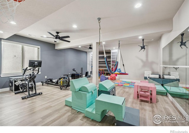 game room featuring baseboards, ceiling fan, wood finished floors, and recessed lighting