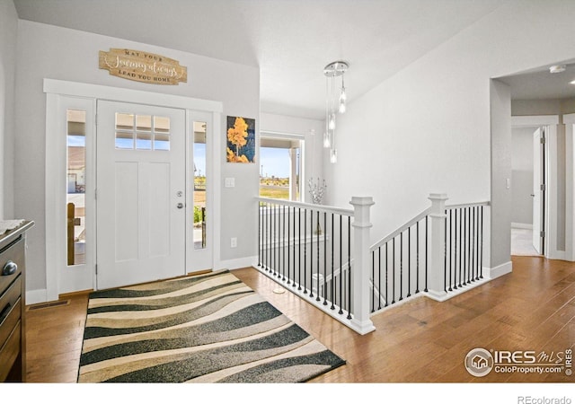 foyer featuring wood-type flooring