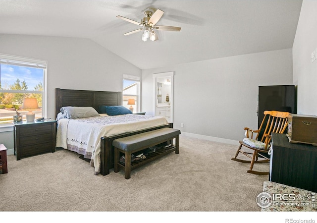 carpeted bedroom featuring ensuite bath, ceiling fan, and lofted ceiling