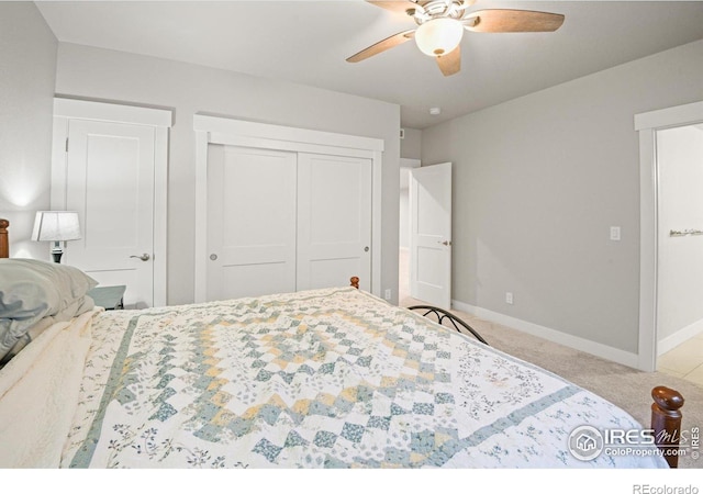 bedroom with light carpet and ceiling fan