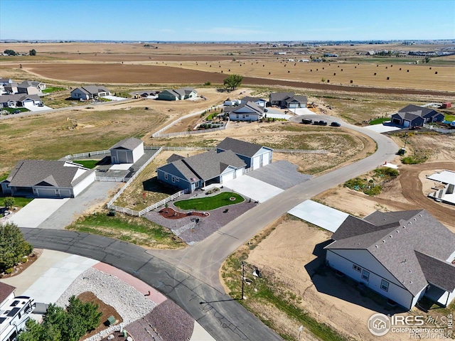 birds eye view of property featuring a rural view