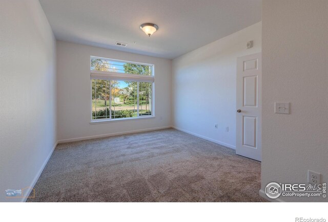 view of carpeted spare room