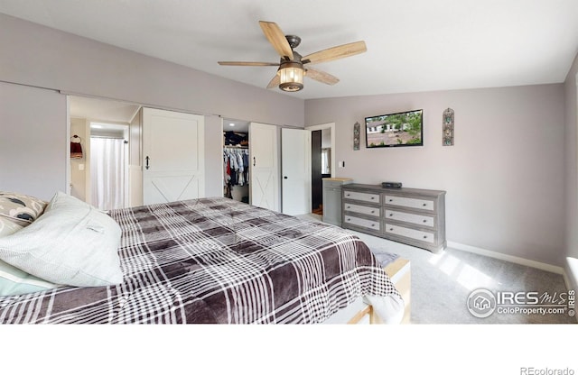 bedroom featuring light colored carpet, ceiling fan, and baseboards