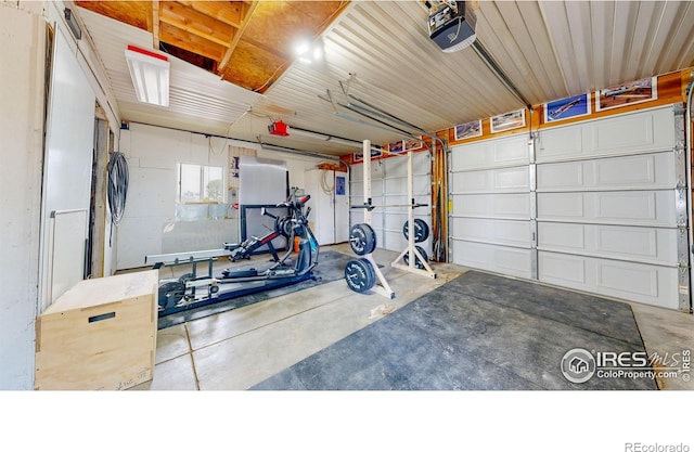 garage featuring a garage door opener